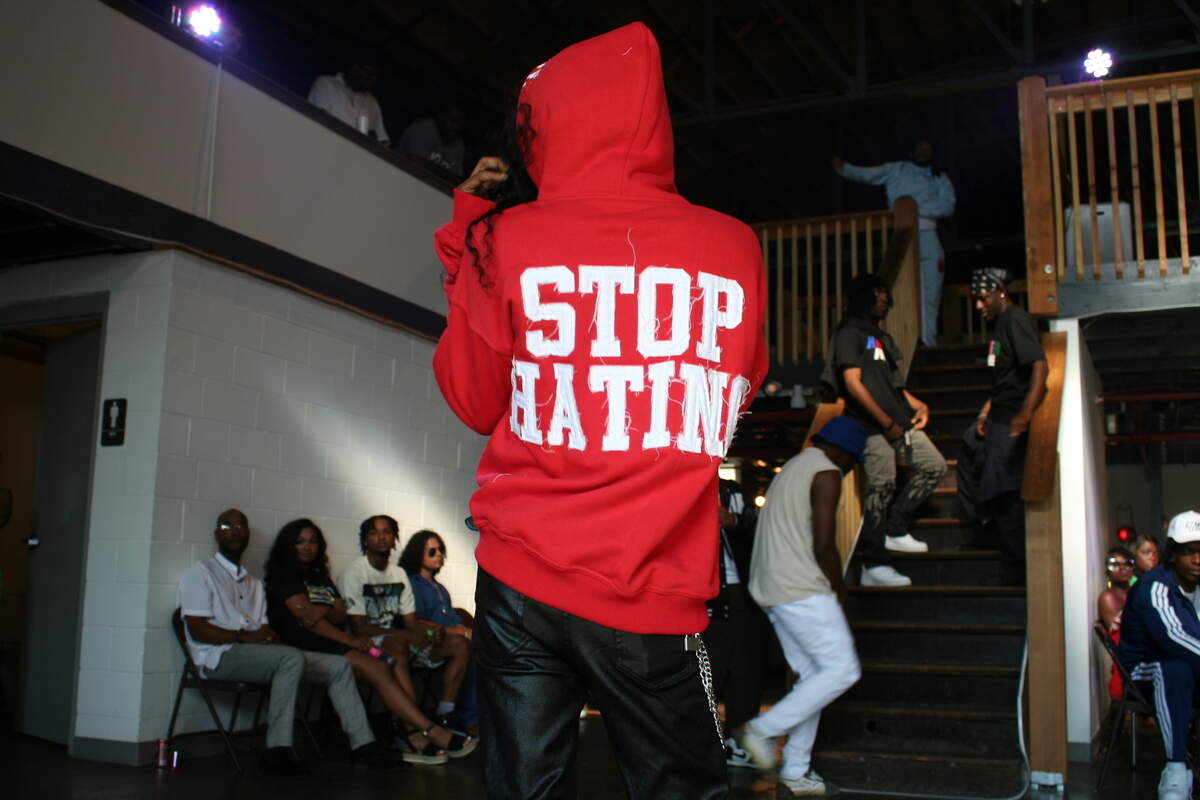 A model shows off a hoodie by Hater Free Apparel at the fashion show. Some of their other models were dogs.