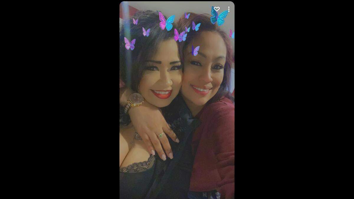 Gabriella Trejo-Garcia and her friend Lizeth Orozco take a picture together.