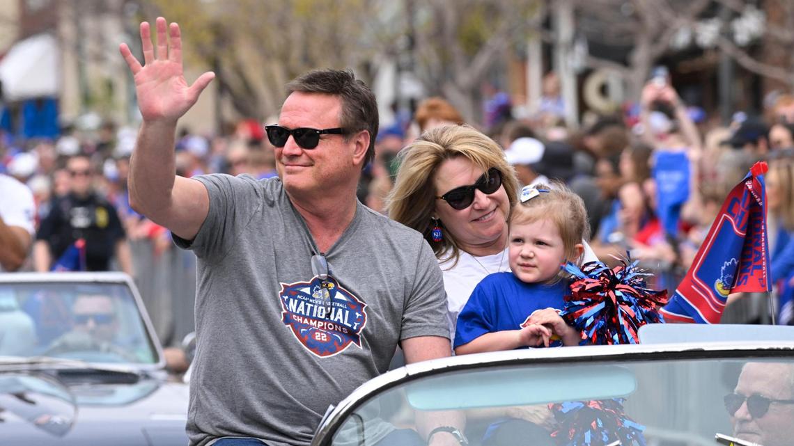 KU Coach Bill Self rides with his wife Cindy and their granddaughter Ella in the Kansas Jayhawks NCAA Championship parade in Lawrence Sunday afternoon.
