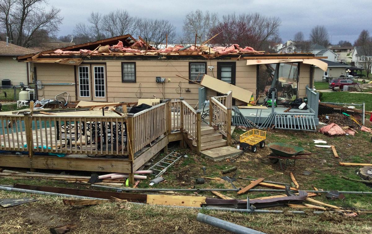 An EF-1 tornado touched down in eastern St. Joseph, Missouri. The tornado, which had winds up to 90 mph, traveled along the ground for 3/10th of a mile, according to a survey team from the National Weather Service in Kansas City. The survey team posted this photo of a damaged home on Twitter.