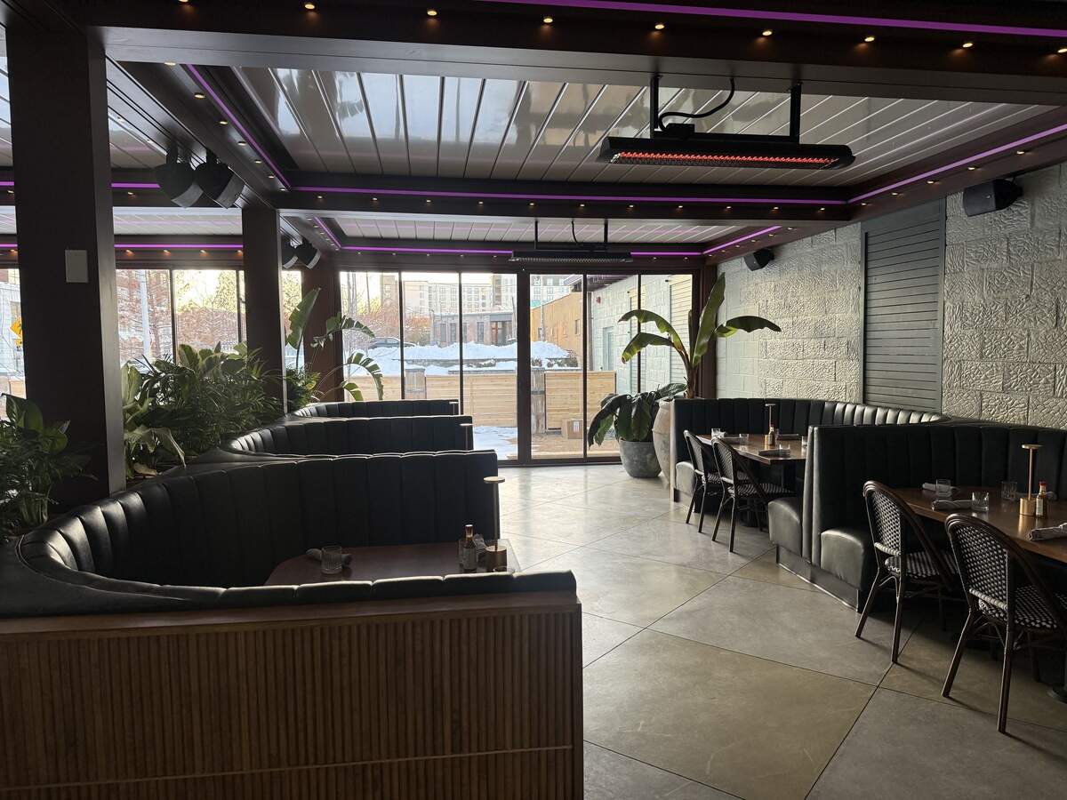 Crossroads Cantina has a sun room. The space was formerly a parking lot, but owner Zach Marten and Bret Springs transformed the building.
