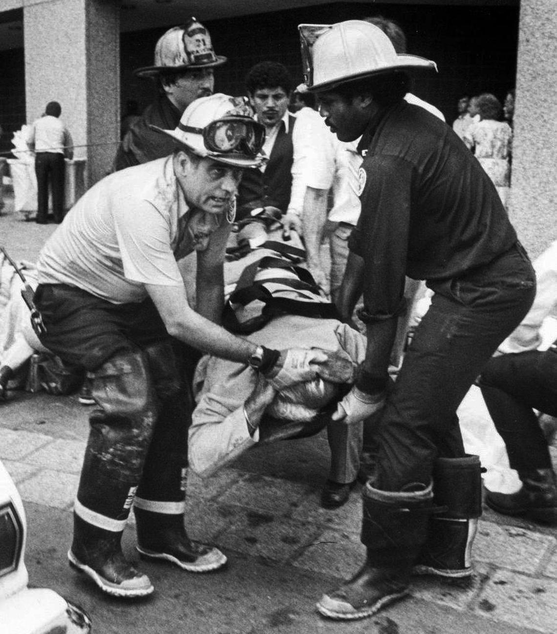 Firefighters and rescue workers carried the injured to ambulances and loaded them into helicopters for transport to the hospitals.