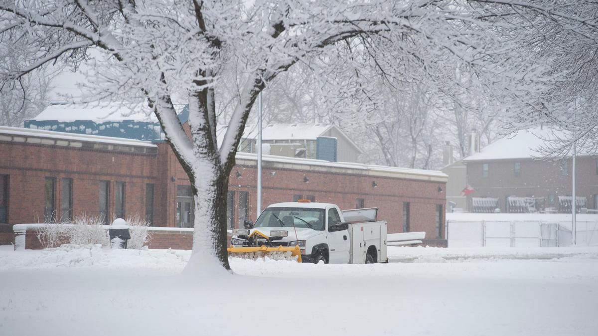 A plow truck is seen working at Chapel Lakes Elementary School in Lee’s Summit on Jan. 24, 2020.