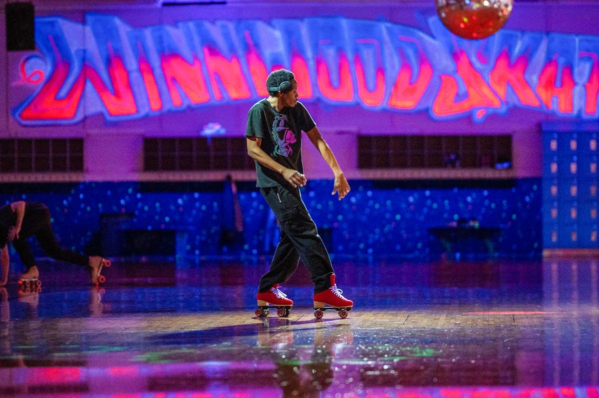 A skater dances in the middle of the arena at Winwood Skate Center on Wednesday, Jan. 11, 2023, in Kansas City.