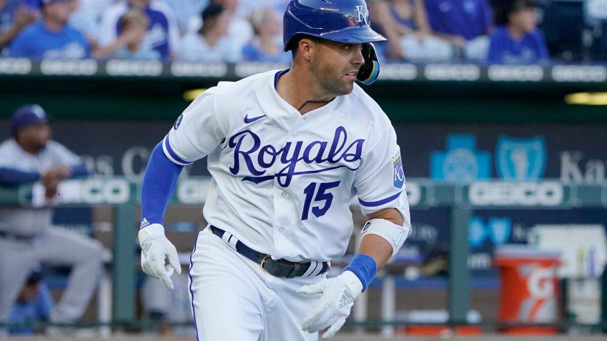 Kansas City Royals’ Whit Merrifield runs to first after hitting a two-run double in the third inning against the Tampa Bay Rays during a baseball game Saturday, July 23, 2022, in Kansas City, Mo. (AP Photo/Ed Zurga)