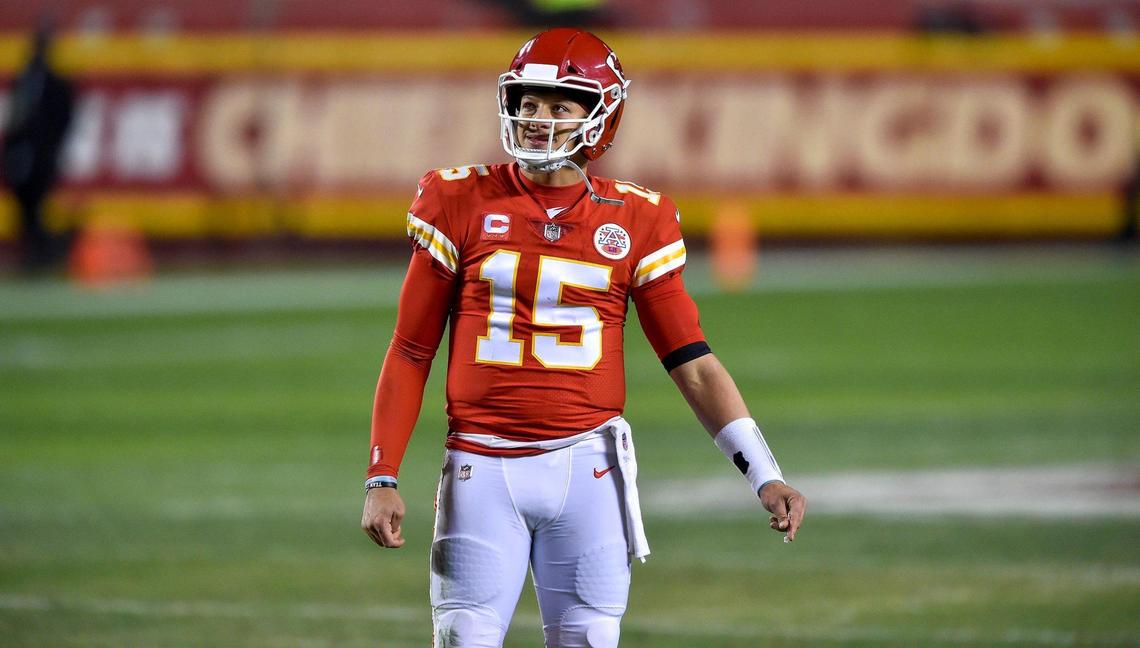 Kansas City Chiefs quarterback Patrick Mahomes smiles as he waits for the play clock to run down in the fourth quarter of the AFC Championship Game between the Chiefs and the Buffalo Bills Sunday Jan. 24, 2021. The Chiefs defeated the Bills 38-24 and will return to the Super Bowl.