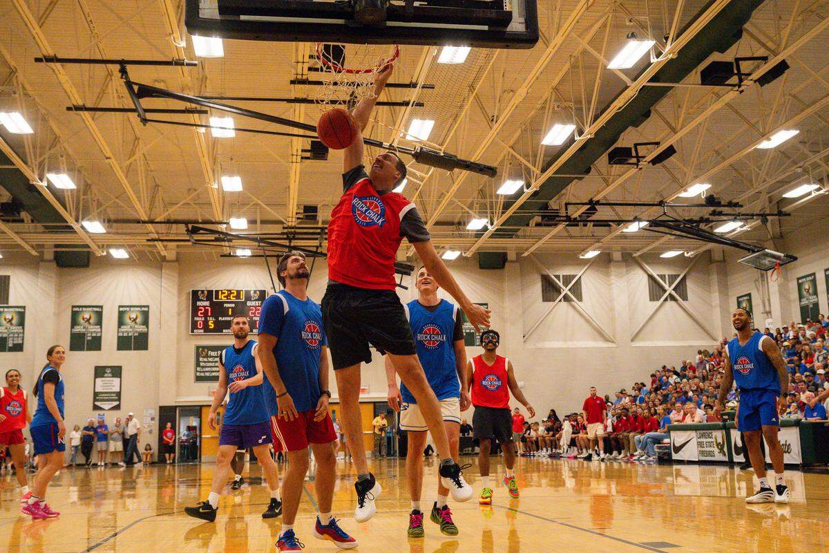 Sasha Kaun dunks the ball during the Rock Chalk Roundball Classic at Free State High in Lawrence, Kansas on Thursday, June 4, 2026.