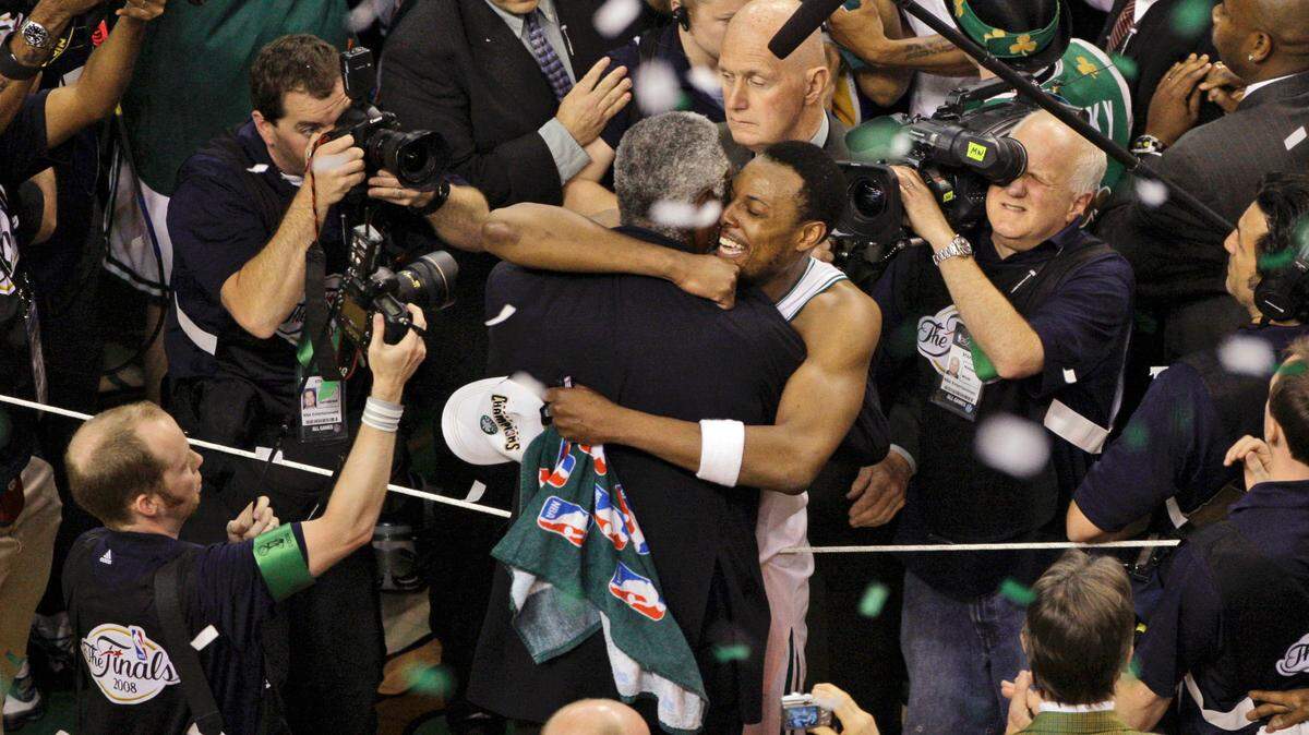 In this June 17, 2008, file photo, Boston Celtics forward Paul Pierce hugged Celtics Hall of Fame center Bill Russell as the Celtics celebrated their 131-92 win over the Los Angeles Lakers to win the NBA championship in Boston. Paul Pierce joined the Hall of Fame and Russell went in as a coach in 2021.