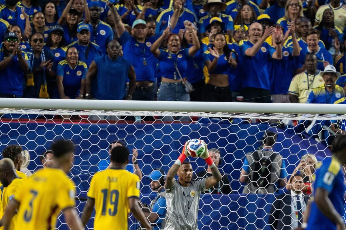 Curaçao goalkeeper Eloy Room (1) makes a save in a FIFA World Cup group-stage soccer match at Kansas City (Arrowhead) Stadium in Kansas City on Saturday, June 20, 2026.