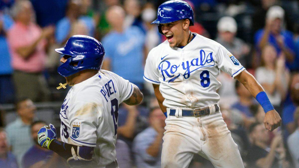 Kansas City Royals’ Salvador Perez, left, celebrates his three-run home run against the Oakland Athletics with teammate Nicky Lopez (8) during the sixth inning of a baseball game, Tuesday, Sept. 14, 2021 in Kansas City, Mo. (AP Photo/Reed Hoffmann)