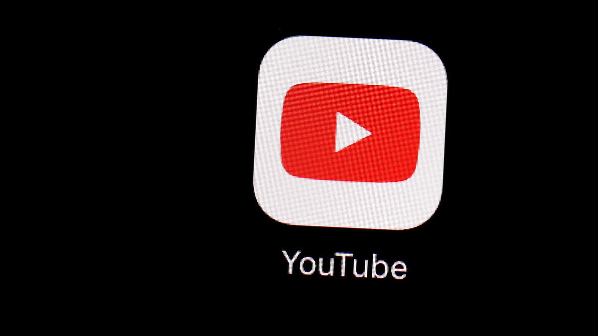 This March 20, 2018 photo shows the YouTube app on an iPad in Baltimore. (AP Photo/Patrick Semansky)