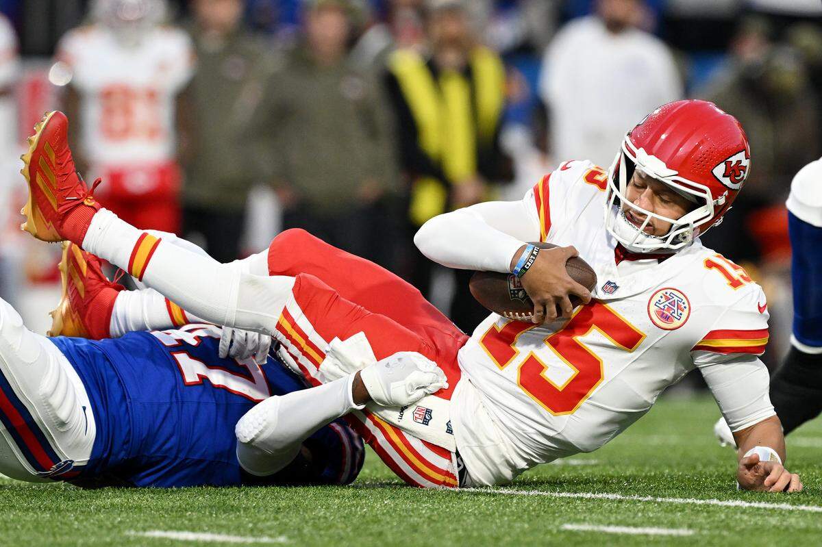 Christian Benford, left, of the Buffalo Bills puts Kansas City Chiefs quarterback Patrick Mahomes on his back during an NFL Week 9 game at Highmark Stadium in Orchard Park, New York, on Sunday, Nov. 2, 2025.