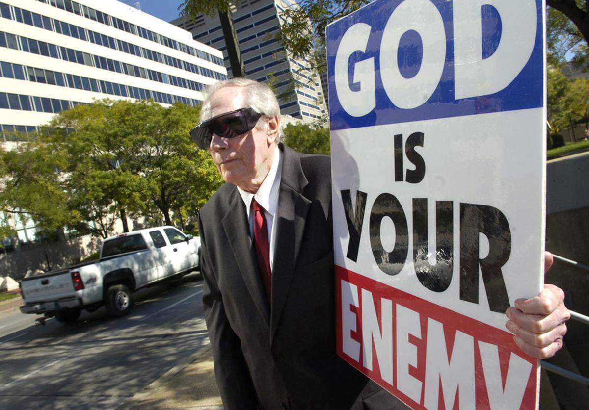 Fred Phelps and members of the Topeka, Kansas based Westboro Baptist Church demonstrate on Pratt Street in downtown Baltimore, Maryland, Wednesday, October 31, 2007, across from the U.S. District Court. A jury is deliberating whether the church and its members can be held legally liable in a suit brought by Albert Snyder, father of Lance Cpl. Matthew A. Snyder, whose funeral the group demonstrated at in Westminster, MD, in March of 2006. (Photo by Jed Kirschbaum/Baltimore Sun/MCT/Sipa USA)
