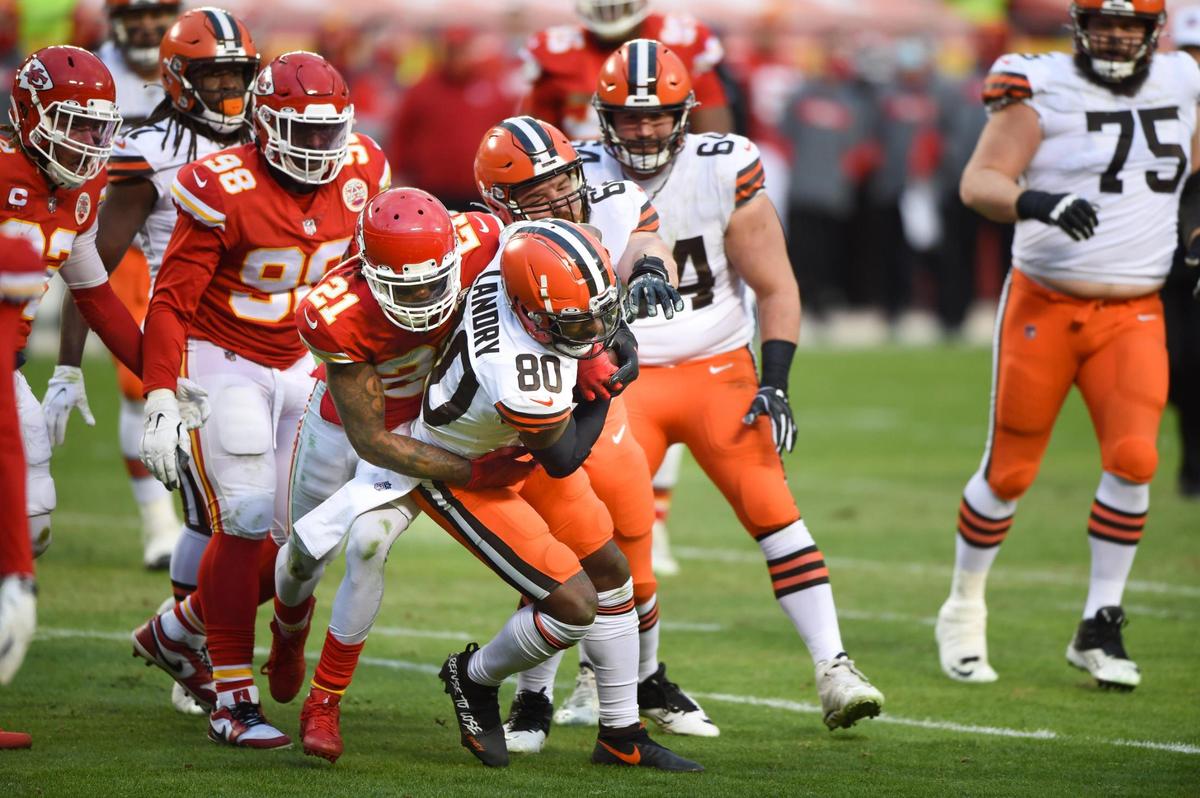 Kansas City Chiefs cornerback Bashaud Breeland (21) tackled Cleveland Browns wide receiver Jarvis Landry (80) in the second-half of game against the Cleveland Browns during AFC divisional playoff game Sunday, Jan. 17, 2021 at Arrowhead Stadium. The Chiefs held on to win, 22-17.