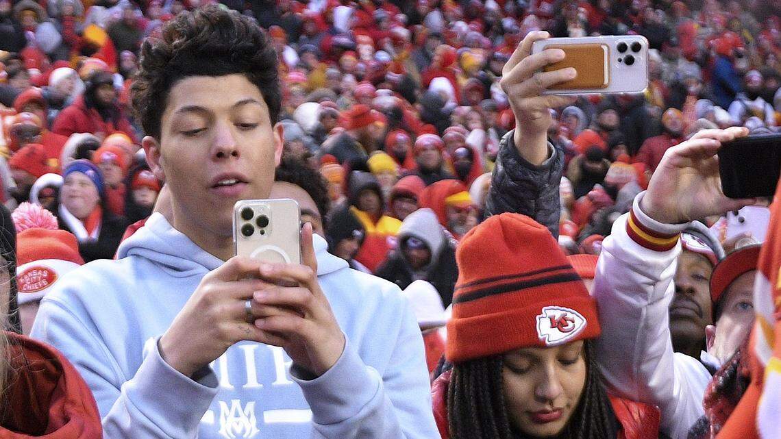Jackson Mahomes, seen here on the Chiefs sidelines in January, returned to social media over the weekend at a St. Louis Cardinals game. He has been largely silent since he was accused in February of sexually abusing the owner of a Johnson County restaurant and lounge.