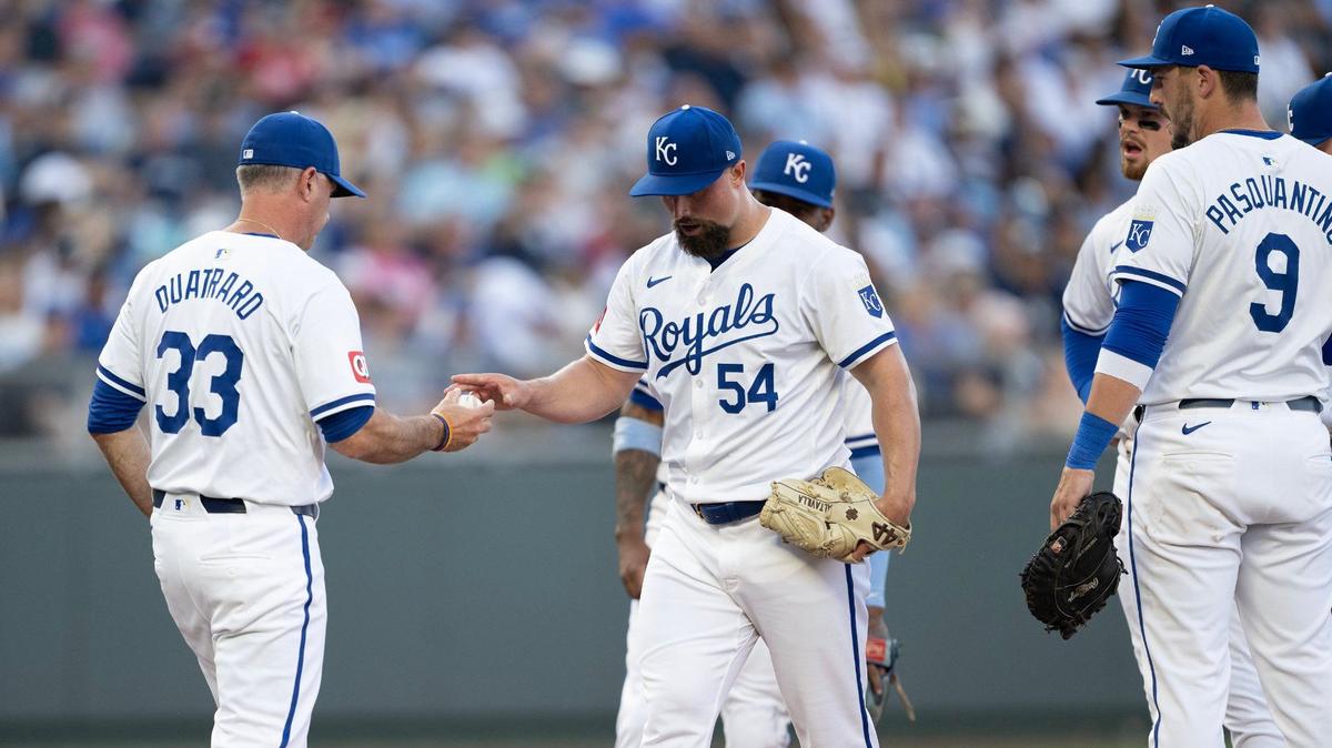 Royals manager Matt Quatraro, left, takes the ball from Royals pitcher Dan Altavilla, who served as an opener against the Yankees on Wednesday evening at Kauffman Stadium. New York jumped on Altavilla for five of their six first-inning runs.