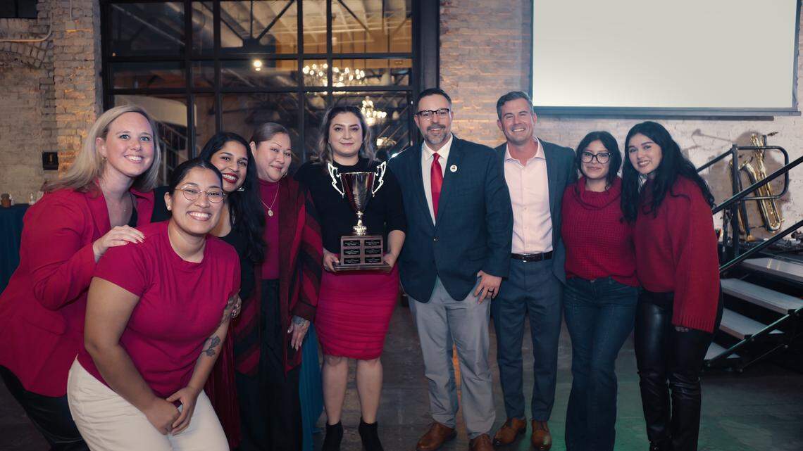 A group of people representing Guadalupe Center High School. They were awarded for being one of the top fundraising groups during Cambio para Cambio in 2024.