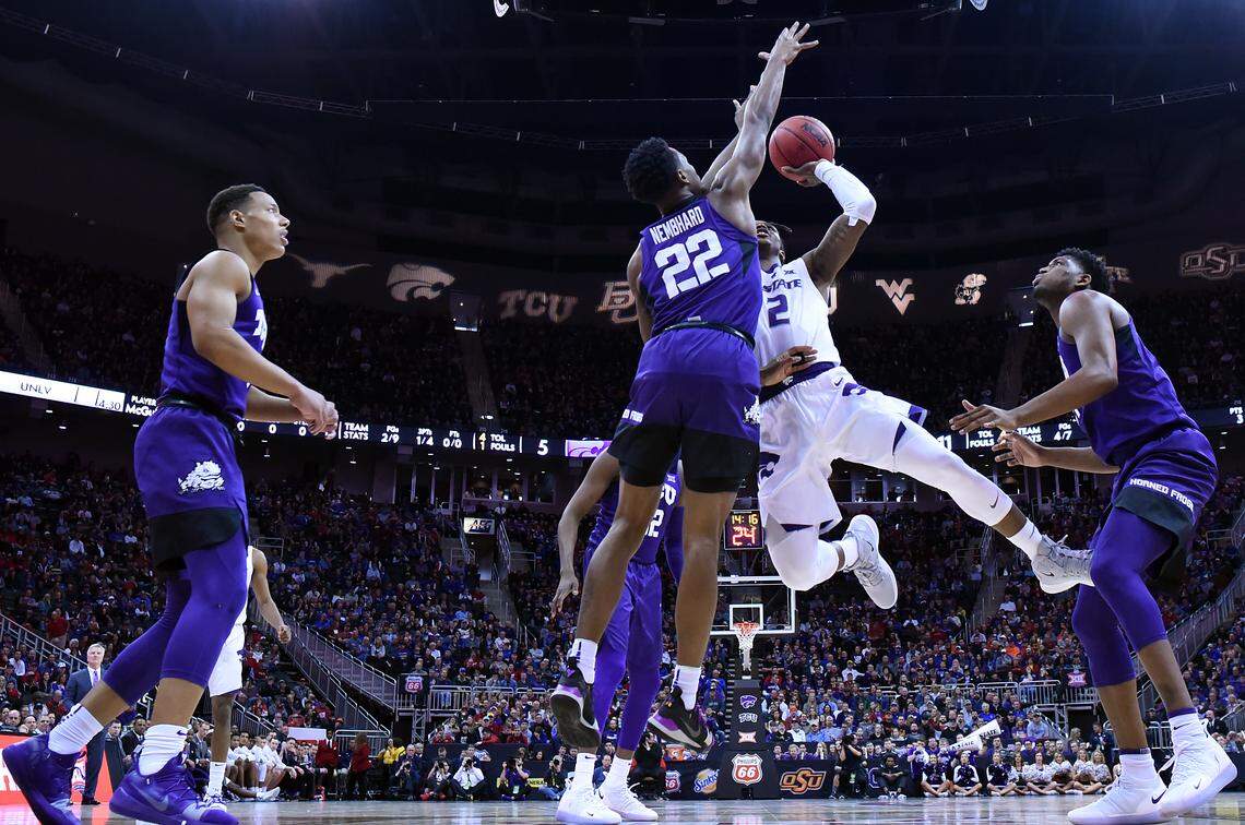 K-State’s Cartier Diarra drives to the basket on TCU’s RJ Nembhard during the first half of Thursday’s Big 12 Tournament game at the Sprint Center. K-State beat TCU, 70-61.