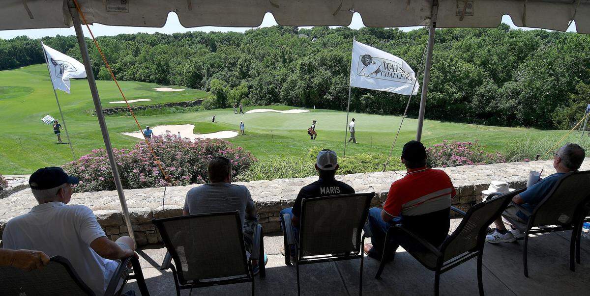 Spectators watch on the 18th green during Friday’s first round of the 2018 Watson Challenge at Shadow Glen Golf Course on June 8, 2018, in Olathe, Kansas.