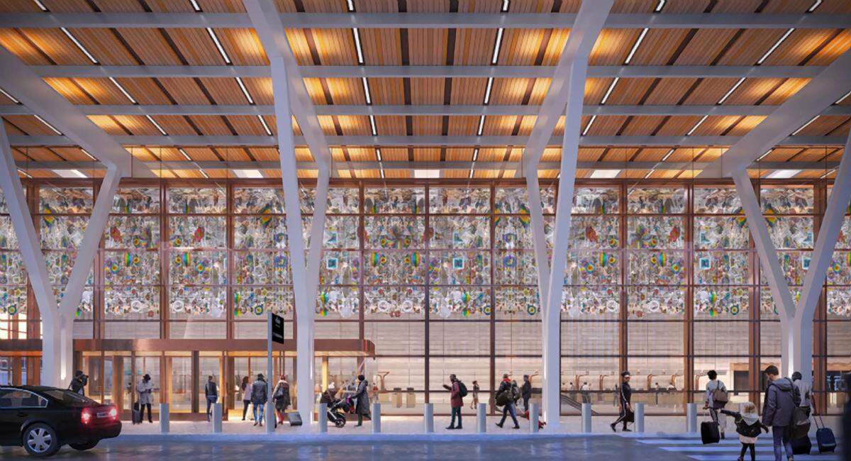 “The Air Up There” by artist Nick Cave is a kinetic sculpture made from thousands of colorful wind spinners consisting of icons of bluebirds, ice cream, turtles, fountains and honeybees. The artwork, suspended from the 65-foot ceiling of the check-in hall, was removed after a spinner fell in October.