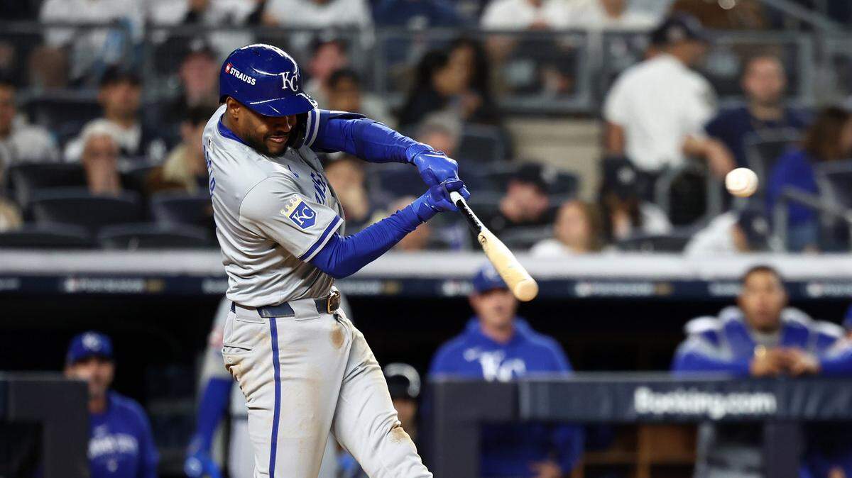 Kansas City Royals third base Maikel Garcia (11) hits a RBI single against the New York Yankees in the fourth inning during game two of the ALDS for the 2024 MLB Playoffs at Yankee Stadium.
