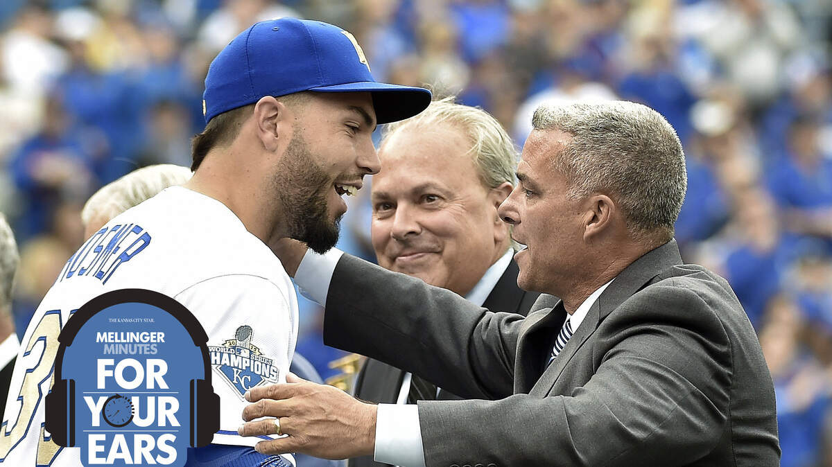 Kansas City Royals’ Eric Hosmer hugs general manager Dayton Moore after receiving his 2015 World Series ring before Tuesday’s baseball game against the New York Mets on April 5, 2016 at Kauffman Stadium in Kansas City, Mo.