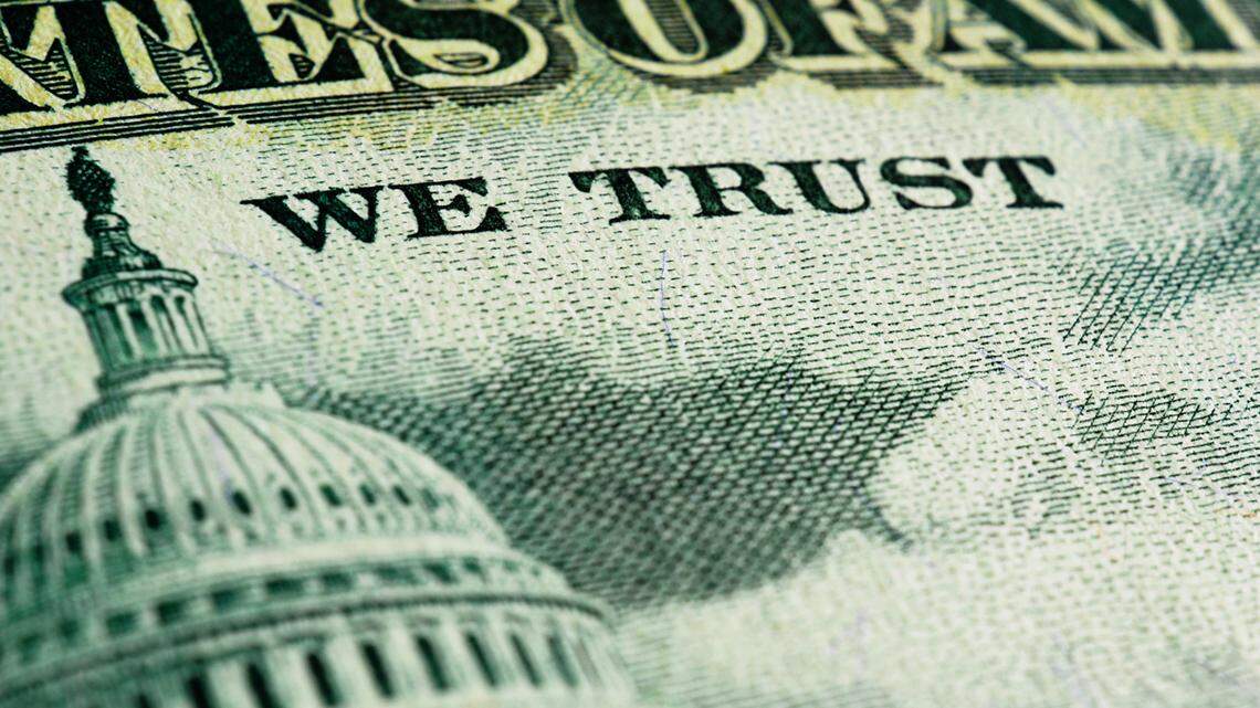 American paper money. Fragment of reverse of $50 bill showing the Capitol. US banknote close-up. Green tinted illustration. National debt and USA dollar. Bonds and treasurys. Macro budget limit ceiling finance