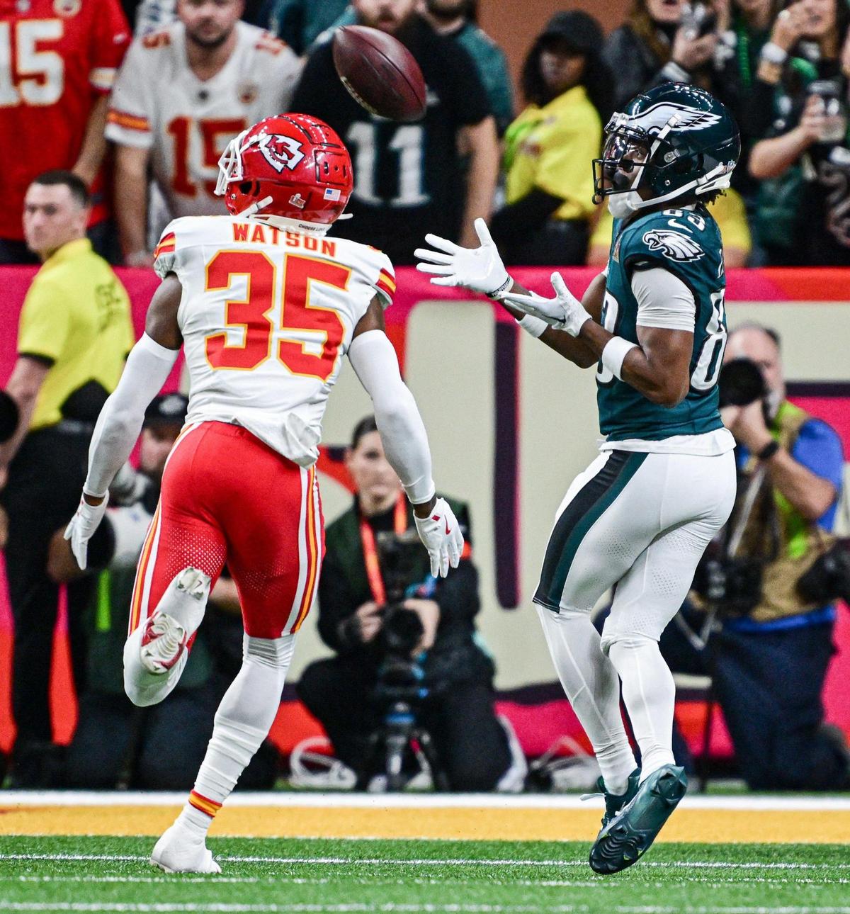 Philadelphia Eagles wide receiver Jahan Dotson (83) makes a catch in front of Kansas City Chiefs cornerback Jaylen Watson (35) in the first quarter during Super Bowl LIX on Sunday, Feb. 9, 2025, in New Orleans.