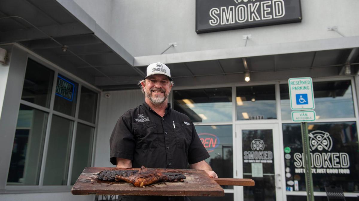 Steve Mock, owner of Smoked, a barbecue restaurant in Harahan, Louisiana, poses for a portrait outside his restaurant on Thursday, Jan. 30. Mock is originally from Lawrence, Kansas.
