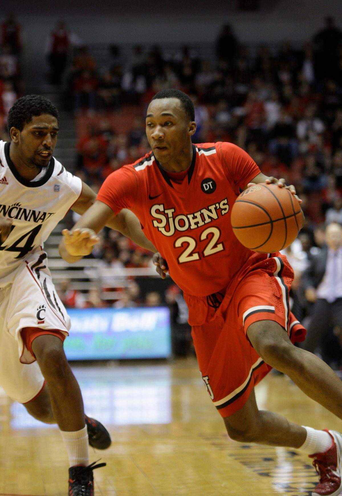 St. John’s forward Amir Garrett (22) in action against Cincinnati in an NCAA college basketball game, Saturday, Jan. 7, 2012, in Cincinnati. (AP Photo/Al Behrman)