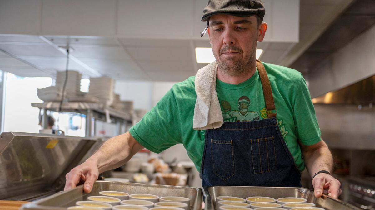 Shaun Brady, chef and co-owner of Brady & Fox, prepares food at the restaurant.