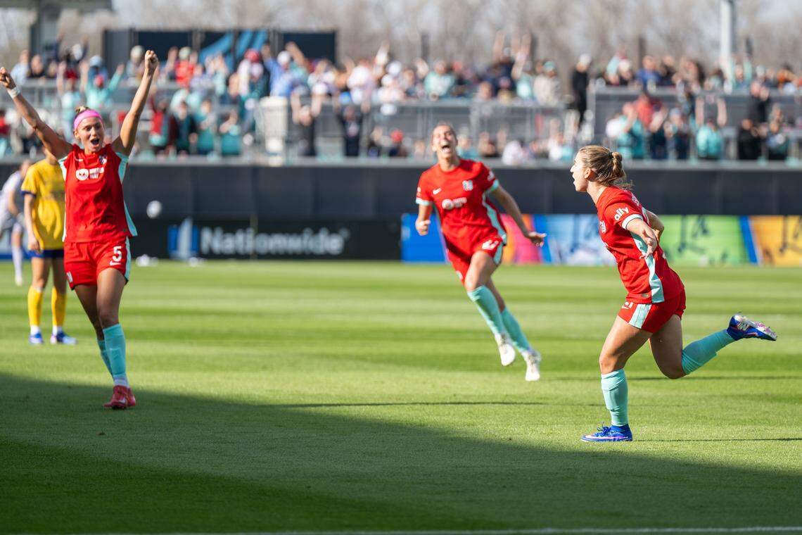 Kansas City Current forward Ally Sentnor (21) celebrates after scoring a goal in the second half of the Current's match vs. the Utah Royals, on Saturday, March 14, 2026, at the CPKC Stadium. The Current won 2-1 against the Utah Royals.