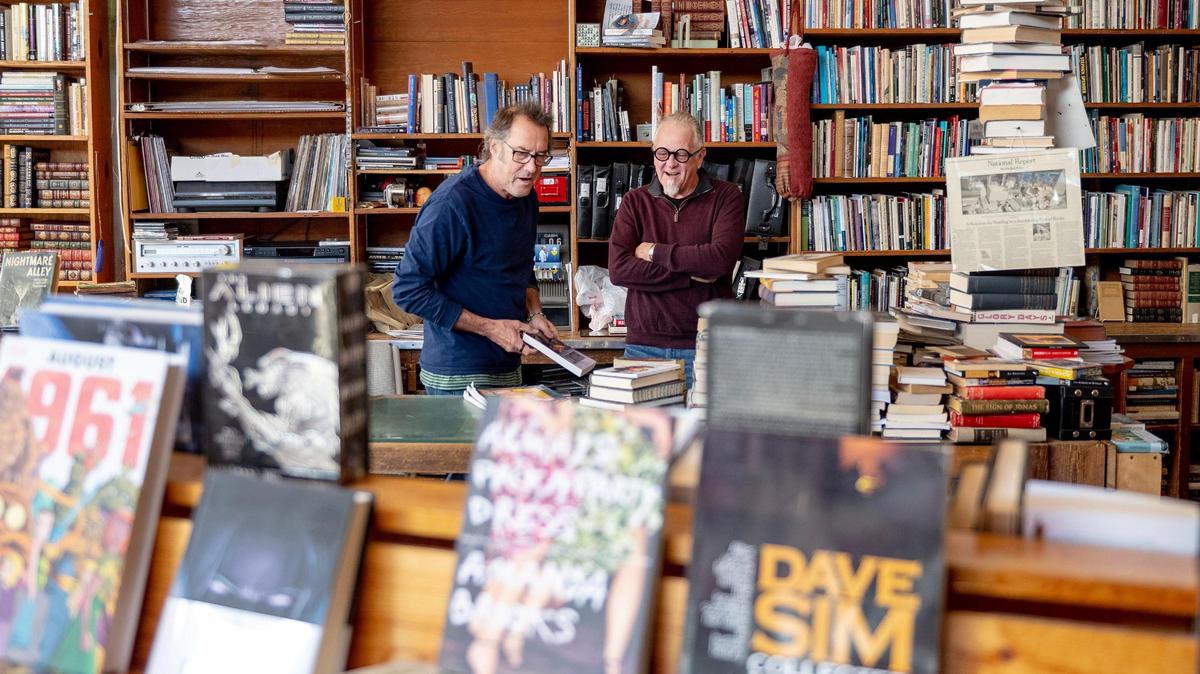 Tom Wayne, left, and Will Leathem, owners of Prospero’s Books, are celebrating the shop’s 25 years in Kansas City.