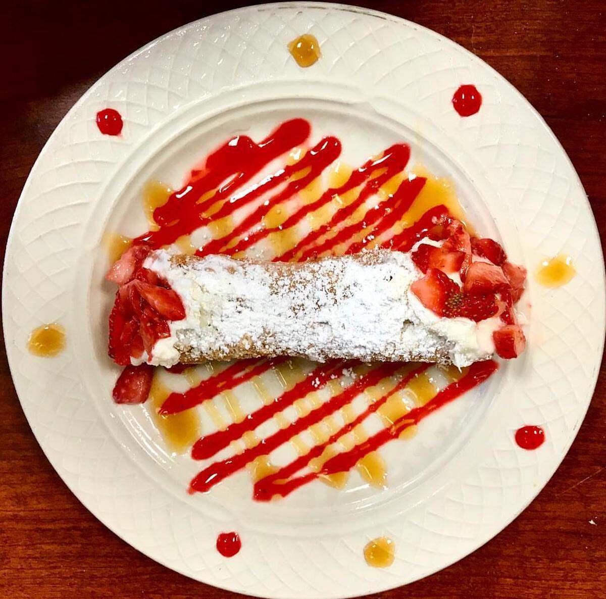 Sister operations, Jasper’s and Marco Polo, are offering Chiefs-themed cannoli - red and white with gold dust.