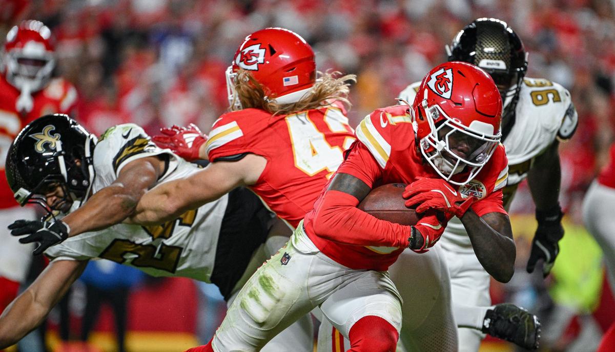 Kansas City Chiefs running back Carson Steele (42) executes a block while wide receiver Xavier Worthy (1) runs in for a touchdown against the New Orleans Saints in the fourth quarter on Monday, Oct. 7, 2024, at GEHA Field at Arrowhead Stadium.