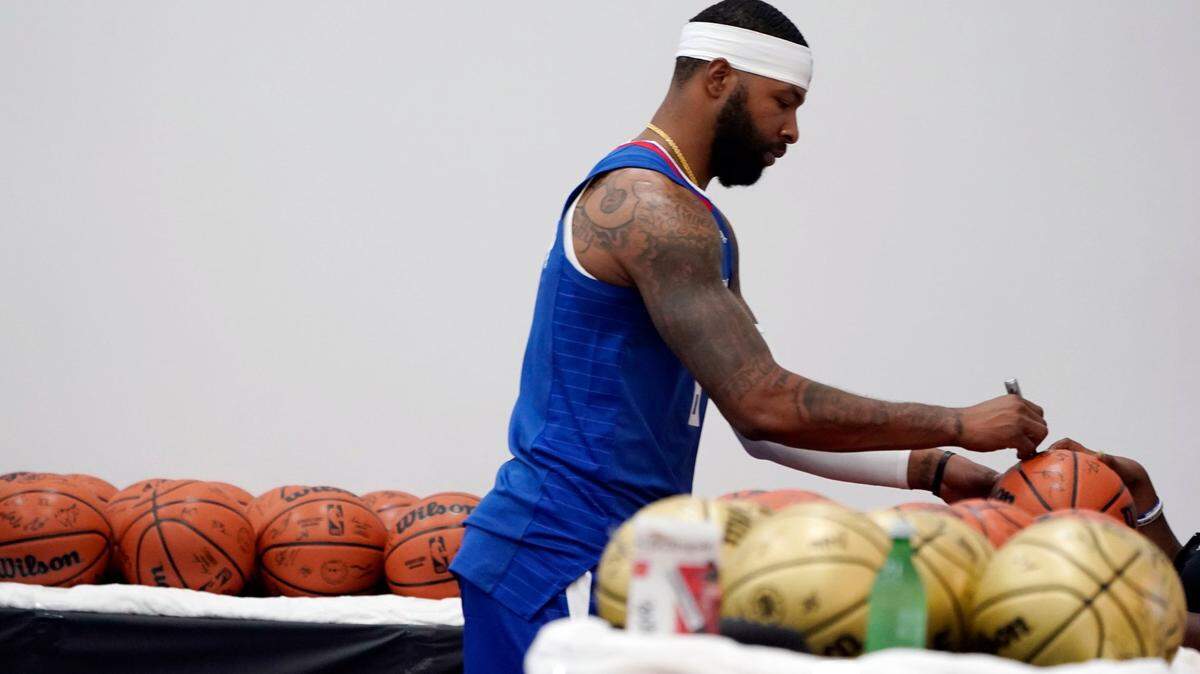 Los Angeles Clippers forward Marcus Morris signs autographs during the NBA basketball team’s media day on Monday, Sept. 26, 2022, in Los Angeles.