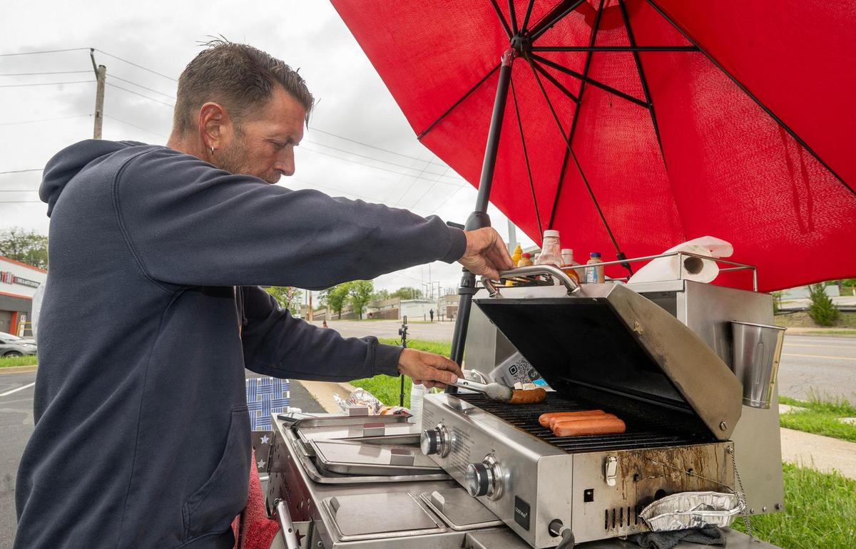 Jason Vandlerlinden has been slinging hot dogs outside From the Earth dispensary since the day medical marijuana sales opened up in Missouri. 