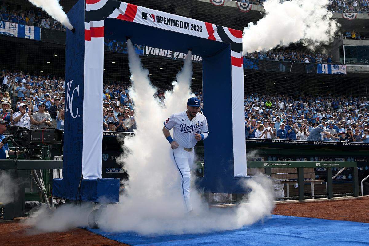 Kansas City Royals first baseman Vinnie Pasquantino (9) walks out during player introductions before the home opener against the Minnesota Twins at Kauffman Stadium on Monday, March 30, 2026, in Kansas City.