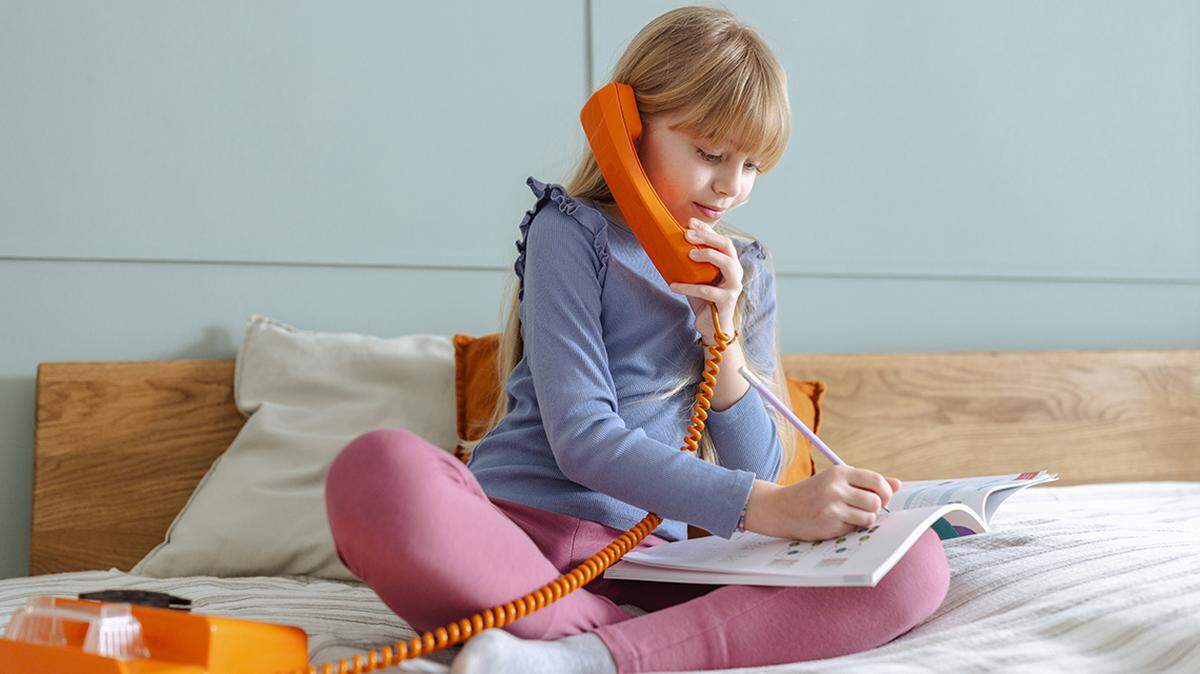 Parents at Nativity Parish School in Leawood will give students landline phones to teach them how to listen and communicate.