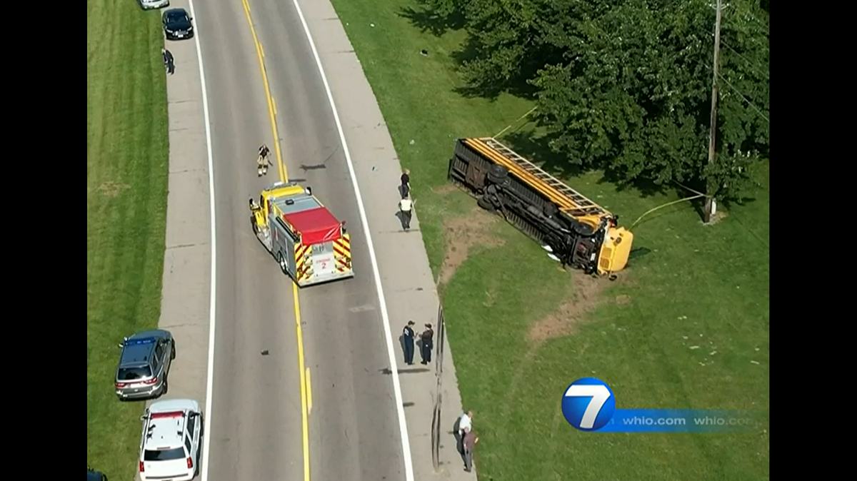 A minivan crashed into a school bus, killing one student and injuring many more, Ohio police say.