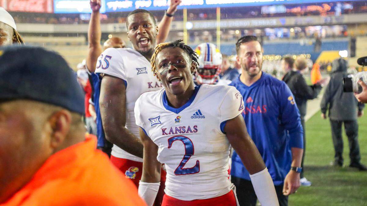 Kansas Jayhawks cornerback JaCobee Bryant (2) celebrates after defeating the West Virginia Mountaineers at Mountaineer Field at Milan Puskar Stadium on Sept. 10, 2022.