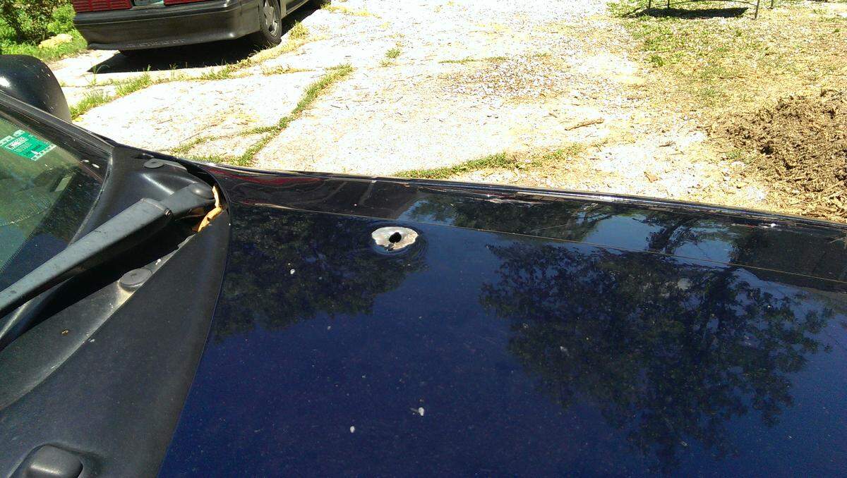 A bullet hole was left in an SUV in front of Larry San Nicolas' home after Grandview police fatally shot the 60-year-old man July 1, 2018. San Nicolas was shot as he walked toward the officers holding a raised sword in his hand. The officer who shot at San Nicolas was positioned behind the SUV as San Nicolas walked down the driveway toward the officers.