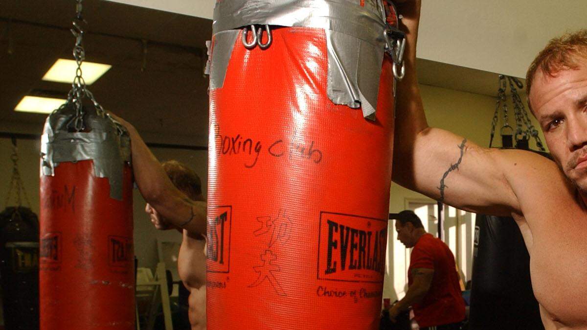 Former professional boxer Tommy Morrison is applying to get his boxing license renewed so he can start boxing again after 10 years away from the sport. Morrison is photographed at Munoz Boxing Gym where he trains in Phoenix. (Oct. 12, 2006)