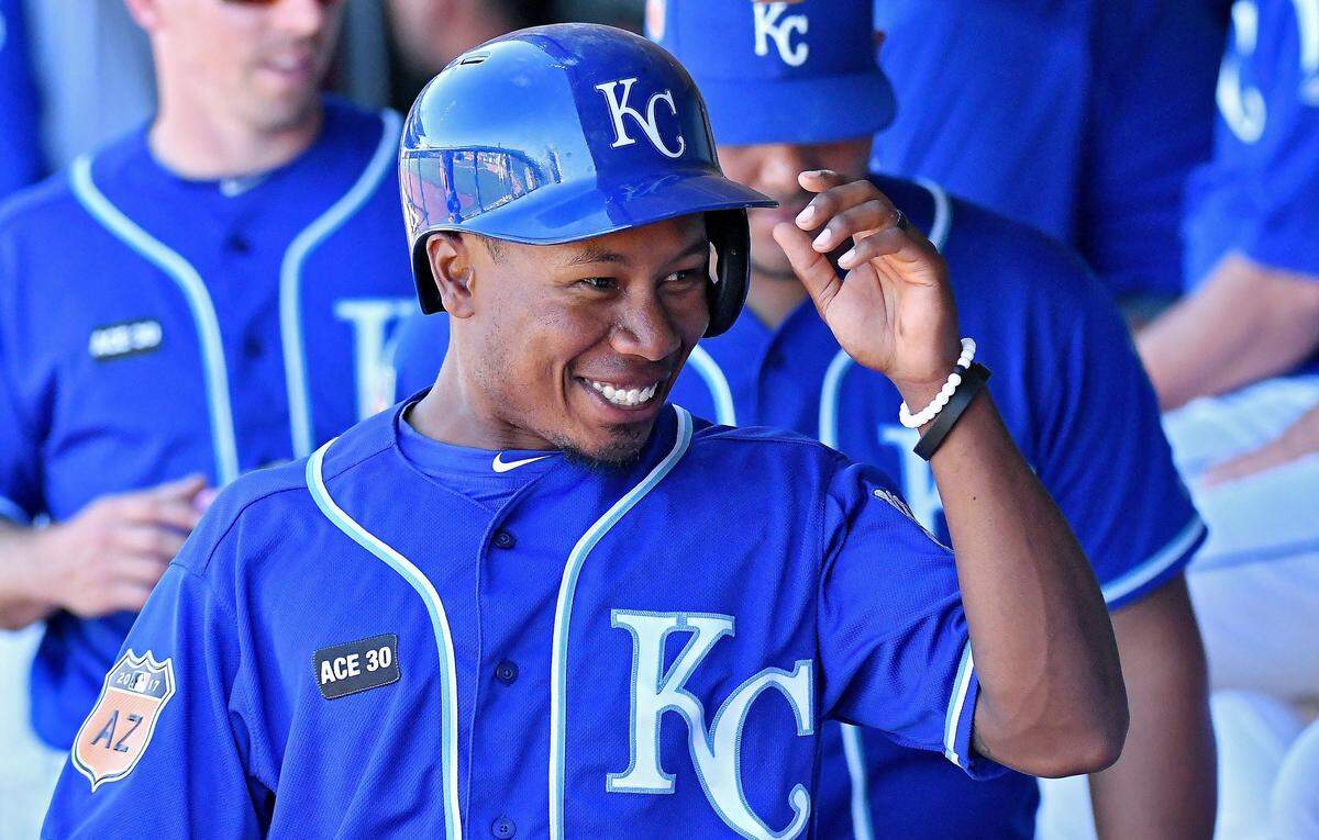Kansas City Royals' Terrance Gore smiles after scoring on a single by Brandon Moss in the sixth inning during Tuesday's spring training baseball game against the Los Angeles Angels in Surprise, Arizona.