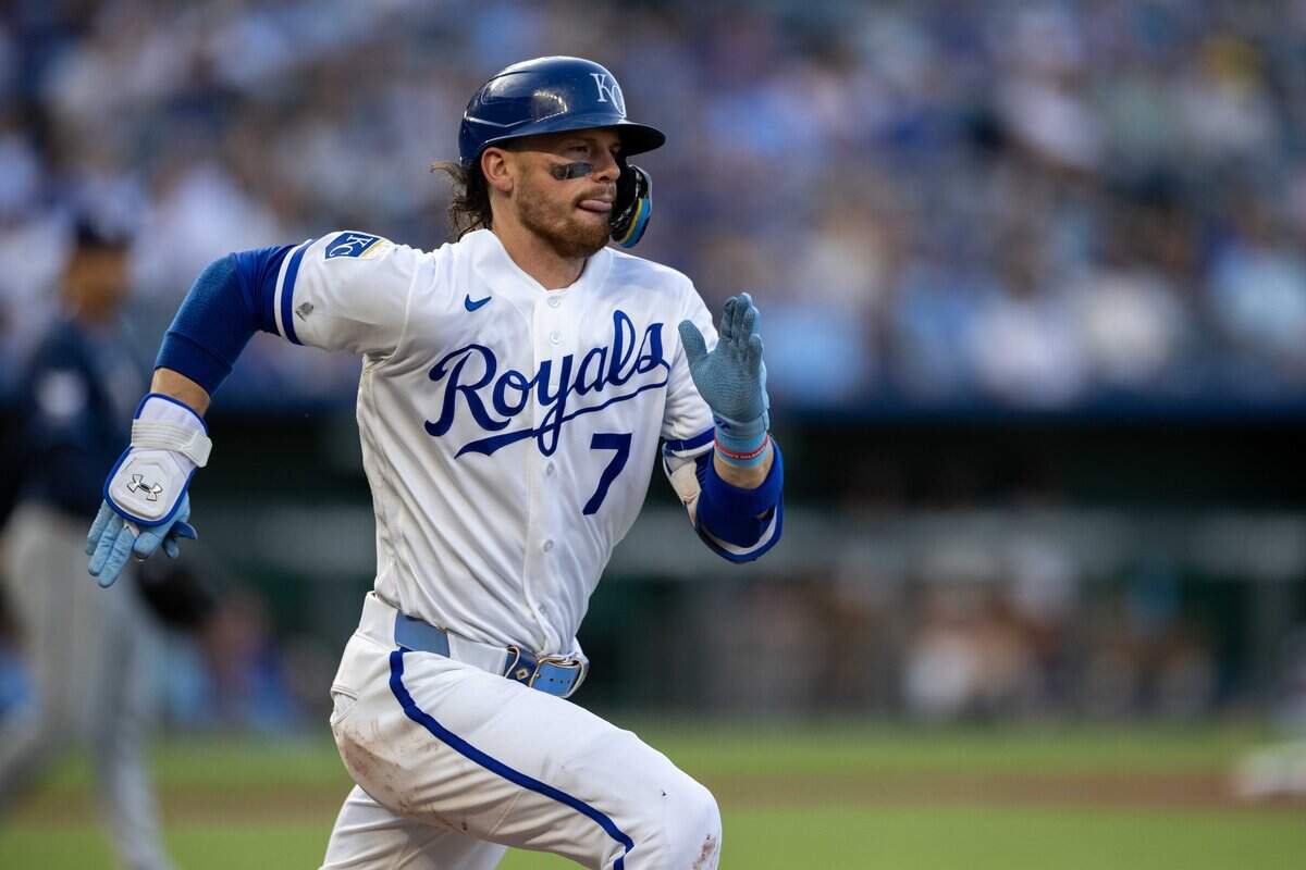 Infielder Bobby Witt Jr., #7, darts to first base during Thursday's Armed Forces Night game at Kauffman Stadium on July 2, 2026. The Tampa Bay Rays came out on top over the Royals with a final score of 5 to 2.