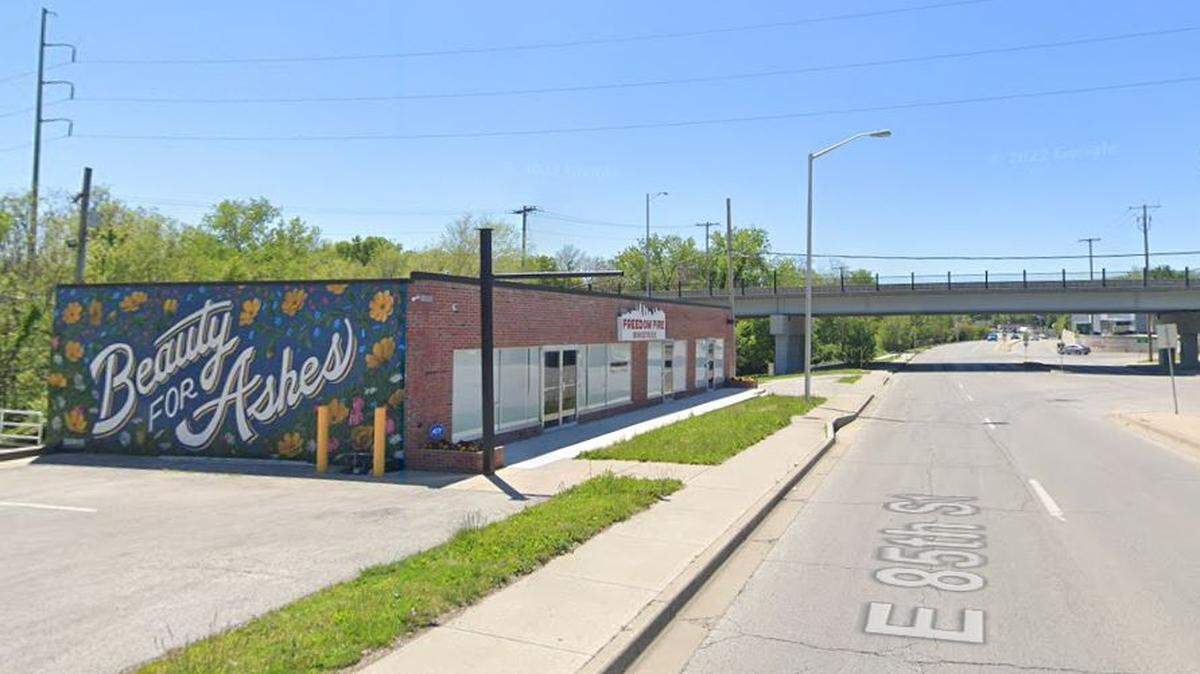A two-vehicle head-on crash along Troost Avenue ended when the driver of a Chevy Silverado crashed into the Freedom Fire Ministries building on East 85th Street. Google Maps street view image from May 2021 shows the general area.