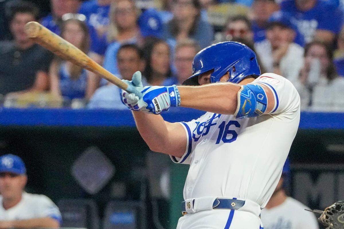 Kansas City Royals right fielder Hunter Renfroe singles in a run against the Los Angeles Angels during Monday evening’s game at Kauffman Stadium.