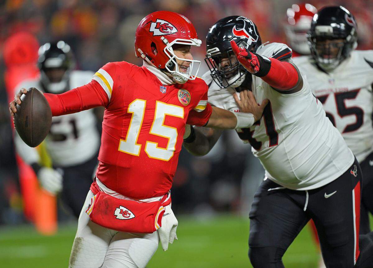 Houston Texans defensive tackle Mario Edwards (97) pressures Kansas City Chiefs quarterback Patrick Mahomes (15) in the second quarter of the game at GEHA Field at Arrowhead Stadium on Sunday, Dec. 7, 2025.