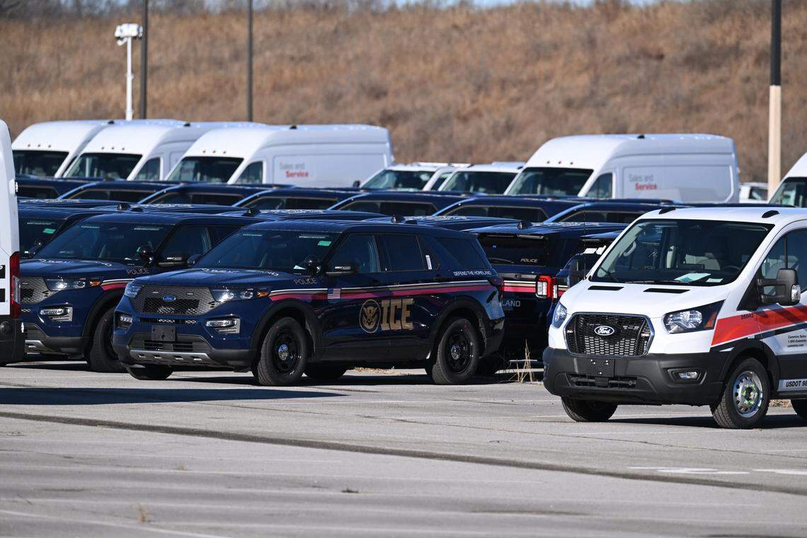 ICE vehicles parked in a lot near Worlds of Fun in Kansas City on Wednesday, January 14, 2026.