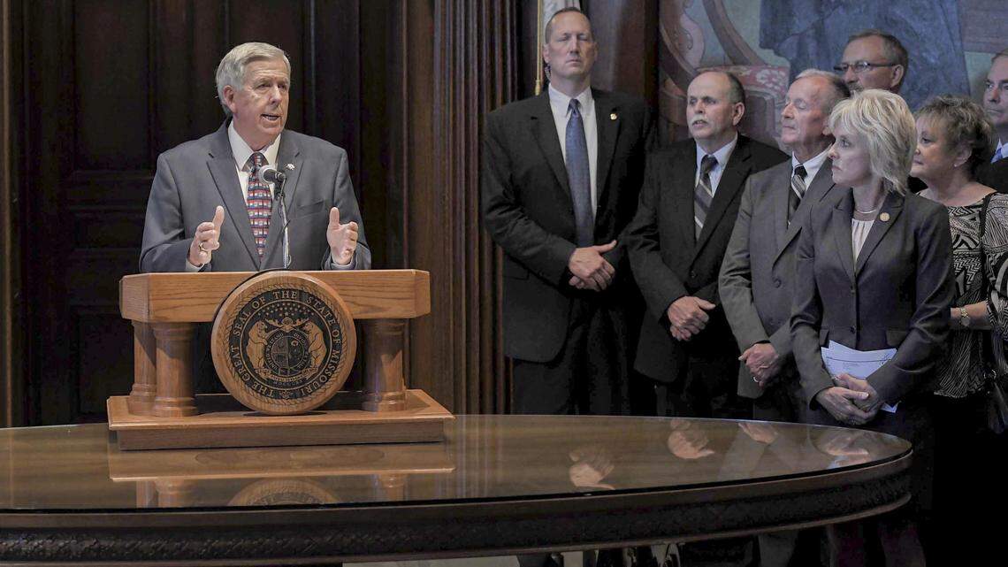 Gov. Mike Parson answers questions from the press after taking the oath of office last week.